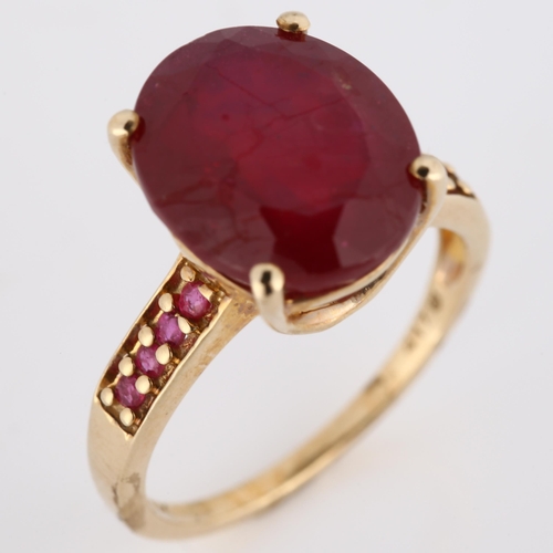 300 - A modern 9ct gold ruby dress ring, with ruby shoulders, ruby length 13.2mm, size N, 4.5g