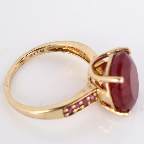 300 - A modern 9ct gold ruby dress ring, with ruby shoulders, ruby length 13.2mm, size N, 4.5g