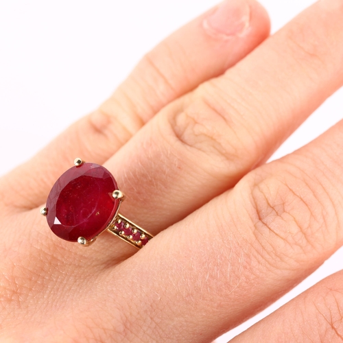 300 - A modern 9ct gold ruby dress ring, with ruby shoulders, ruby length 13.2mm, size N, 4.5g