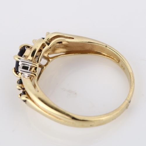 304 - A modern 9ct gold sapphire and diamond dress ring, setting height 7.2mm, size N, 2.7g