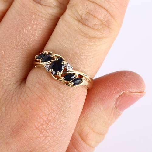 304 - A modern 9ct gold sapphire and diamond dress ring, setting height 7.2mm, size N, 2.7g