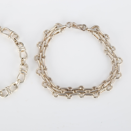 310 - 2 Peruvian silver fancy link chain bracelets, both 19cm long, 34.6g total (2)