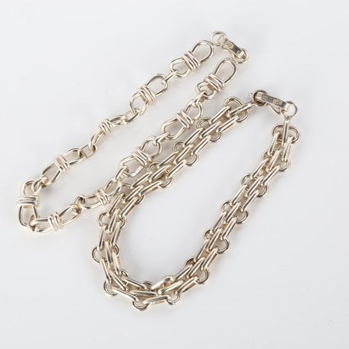 310 - 2 Peruvian silver fancy link chain bracelets, both 19cm long, 34.6g total (2)