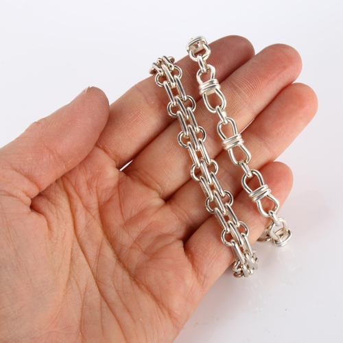 310 - 2 Peruvian silver fancy link chain bracelets, both 19cm long, 34.6g total (2)