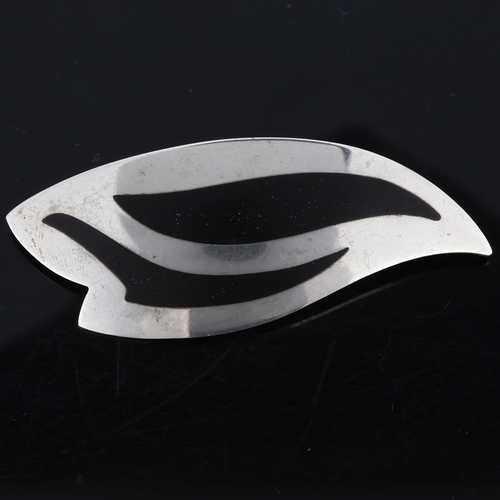 315 - KAI ERLING FEILING - a Danish modernist sterling silver and black enamel wing brooch, model no. 637,... 