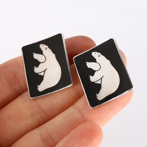 317 - JENS TAGE HANSEN - a pair of Danish modernist sterling silver and black enamel polar bear cufflinks,... 