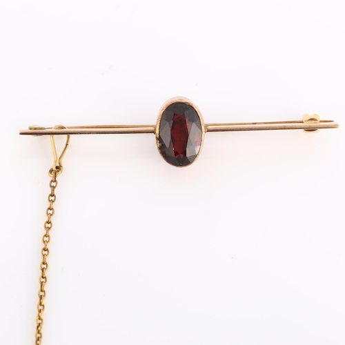 319 - An early 20th century garnet bar brooch, unmarked rose gold settings with oval mixed-cut garnet, bro... 