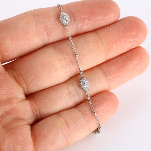 331 - A modern 18ct white gold diamond bracelet, fine curb links with modern round brilliant-cut diamond b... 