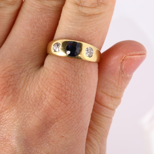 332 - An early 20th century three stone synthetic sapphire and diamond gypsy ring, unmarked gold settings ... 