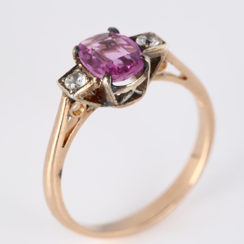 336 - A three stone synthetic pink and white sapphire dress ring, unmarked rose metal settings with oval m... 