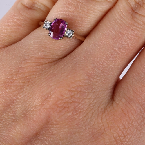 336 - A three stone synthetic pink and white sapphire dress ring, unmarked rose metal settings with oval m... 