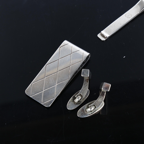 376 - AARRE & KROGH EFTF - a Danish modernist sterling silver dress set, comprising tie clip, money clip, ... 