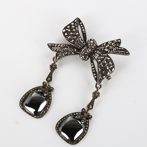 377 - A Vintage silver hematite and marcasite bow drop brooch, height 70.7mm, 23.1g