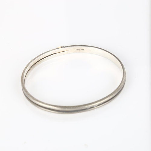 378 - A Danish modernist oxidised and gilded sterling silver bangle and pendant necklace, makers include J... 