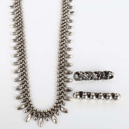 392 - HERMANN SIERSBOL - a Danish stylised sterling silver fringe necklace, length 45cm, and 2 Danish unna... 