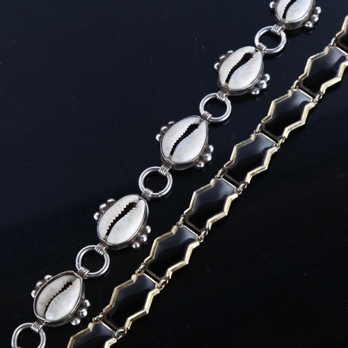 396 - 2 Continental silver bracelets, including Norwegian black enamel and cowrie shell examples, both 19c... 