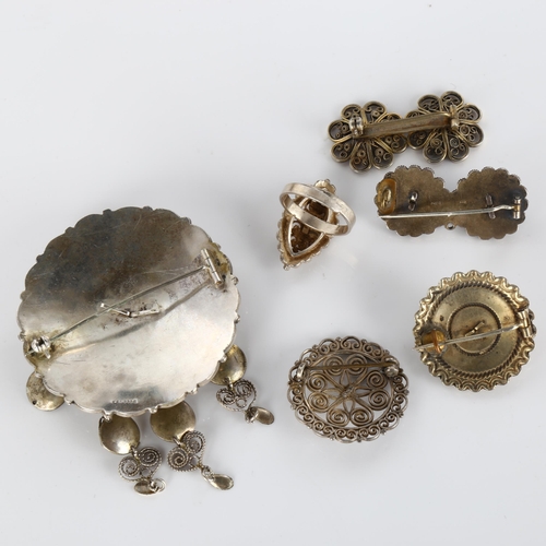 409 - Various Norwegian silver Folk Art jewellery, including brooches and ring, size P, 67.6g total (6)