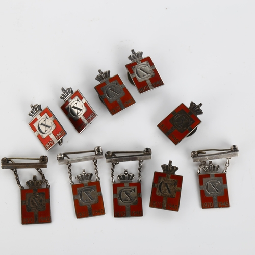 416 - GEORG JENSEN - 10 Danish silver and red enamel Kingmark badges and brooches, height 24.1mm, 36.6g to... 