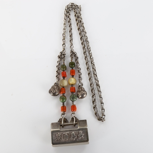 417 - A Chinese silver padlock pendant necklace with coral and mother-of-pearl, necklace length 66cm, 75.7... 