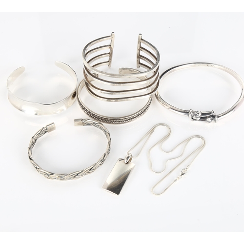 421 - 5 Continental silver bangles, and a pendant necklace, makers include Niels Erik From, 156.6g total (... 