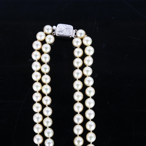 425 - A Vintage double-strand cultured pearl necklace, with 9ct white gold clasp, necklace length 40cm, 49... 