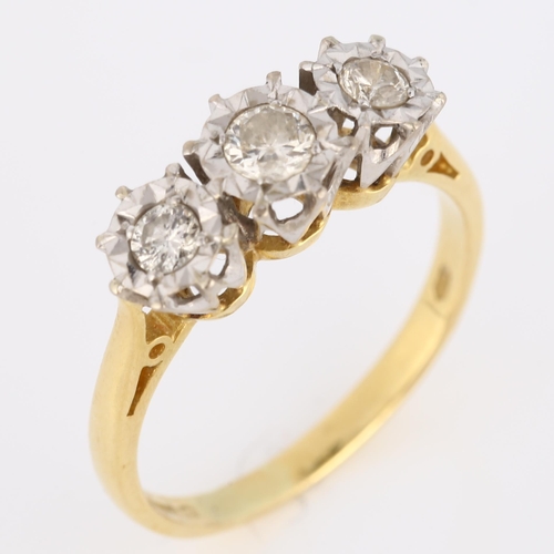 436 - An 18ct gold three stone diamond ring, illusion set with modern round brilliant-cut diamonds, total ... 