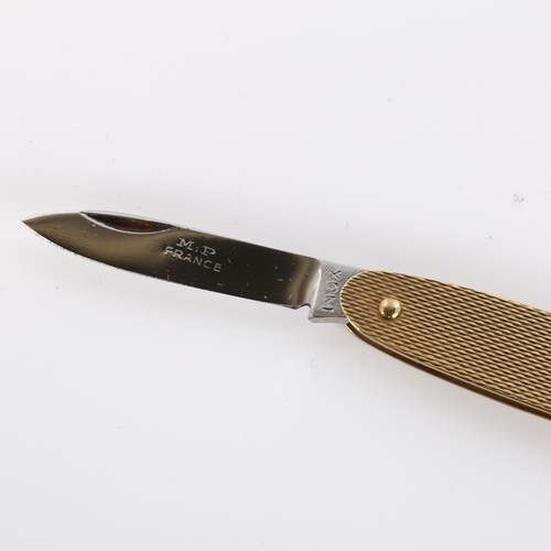 437 - A late 20th century 9ct gold penknife, allover engine turned decoration, makers marks SJR, hallmarks... 