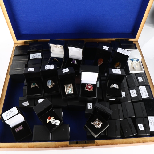 439 - A large quantity of modern silver stone set rings