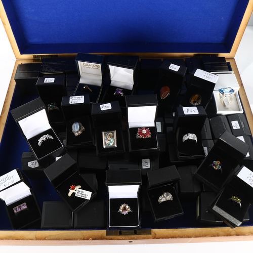 439 - A large quantity of modern silver stone set rings