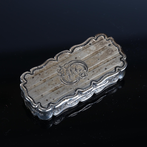 519 - A Victorian silver vinaigrette, shaped rectangular form with engraved and engine turned decoration, ... 