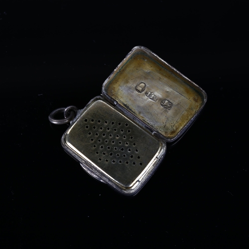 520 - A George III silver vinaigrette, rectangular form with bright-cut engraved decoration, pierced lozen... 