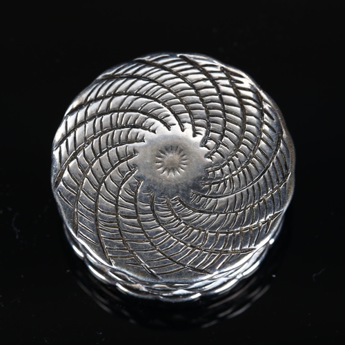 522 - A 19th century miniature unmarked silver basket weave pillbox, with screw-thread cover and gilt inte... 