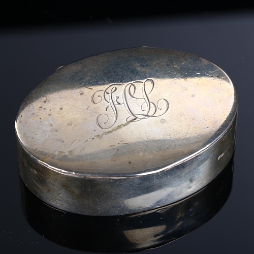 523 - A George V silver snuffbox, plain oval form with gilt interior, by Deakin & Francis, hallmarks Birmi... 