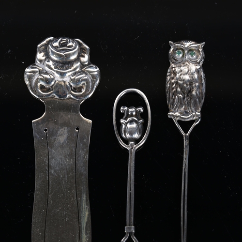 529 - A Danish novelty silver figural owl cheroot holder, silver rose book mark, and another silver plate ... 