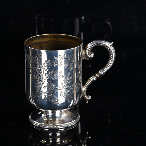 558 - A Victorian silver pedestal christening mug, bright-cut engraved floral decoration with gilt interio... 