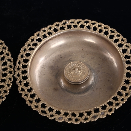 567 - STUART DEVLIN - a pair of Elizabeth II modernist silver and parcel-gilt Royal Silver Jubilee dishes,... 