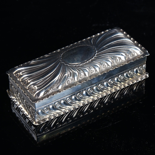 570 - A late Victorian silver dressing table jewel box, rectangular form with fluted decoration and crimpe... 