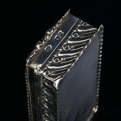 570 - A late Victorian silver dressing table jewel box, rectangular form with fluted decoration and crimpe... 