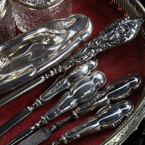 573 - Various silver dressing table items, including manicure and jars, and a silver plated dressing table... 