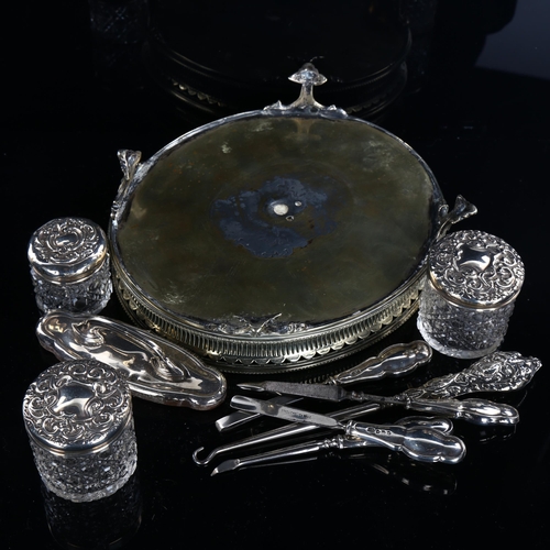 573 - Various silver dressing table items, including manicure and jars, and a silver plated dressing table... 