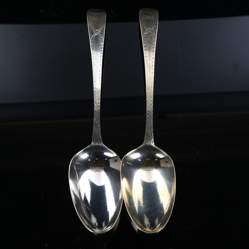 580 - A pair of George III silver Old English pattern tablespoons, bright-cut engraved decoration, by Hest... 