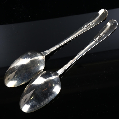 580 - A pair of George III silver Old English pattern tablespoons, bright-cut engraved decoration, by Hest... 