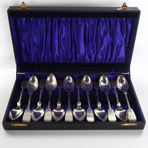 583 - A set of 12 Continental silver Fiddle pattern tablespoons, with scratch test marks verso, length 22c... 