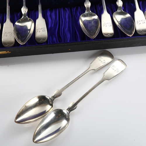 583 - A set of 12 Continental silver Fiddle pattern tablespoons, with scratch test marks verso, length 22c... 