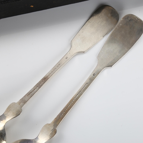 583 - A set of 12 Continental silver Fiddle pattern tablespoons, with scratch test marks verso, length 22c... 