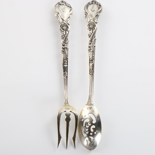 589 - *WITHDRAWN* GORHAM - an American sterling silver matching sifter spoon and fork, cast cherub decorat... 