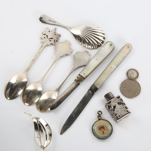 602 - Various silver, including tea caddy spoon, mother-of-pearl fruit knives, brooch etc