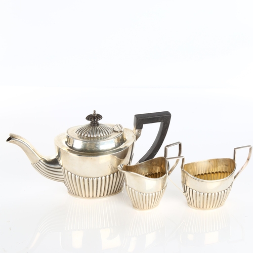 613 - A late Victorian silver 3-piece bachelor's tea set, comprising teapot, 2-handled sugar bowl and crea... 