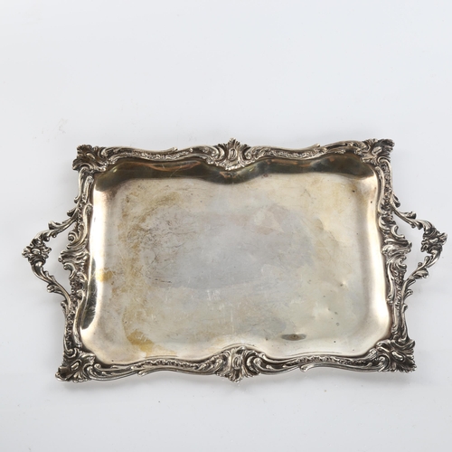 616 - A 19th century French silver 2-handled dressing table tray, rectangular form with cast foliate rim, ... 