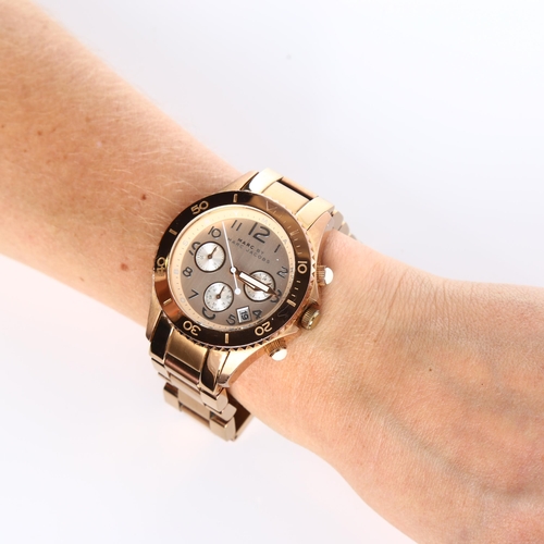 69 - 2 lady's wristwatches, comprising Marc Jacobs and Michael Kors, both working (2)